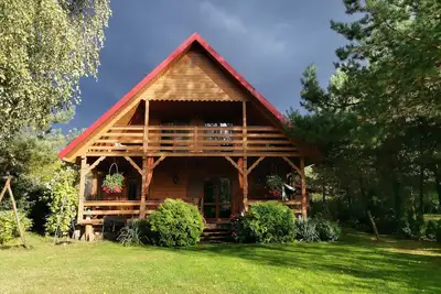 Image de Luksusowa willa z dużym ogrodem i zadaszonym tarasem. , 150 m do jeziora Mielno