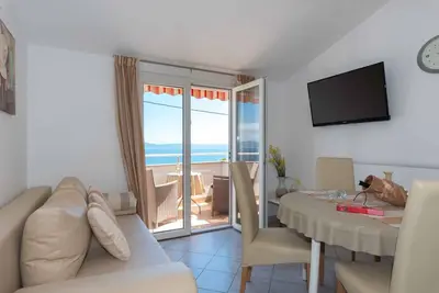 Image de Appartement de vacances avec vue sur la mer et possibilité de faire un barbecue