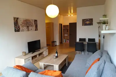 Image de Un appartement d'angle, un sentiment d'être chez soi, ainsi que les avantages d'un hôtel