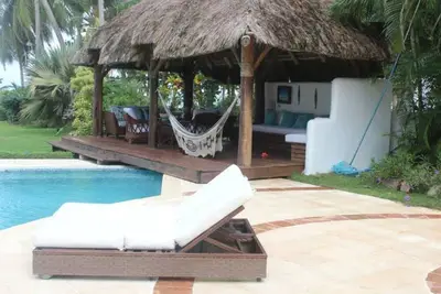 Image de Is a beautiful beach villa, gorgeous pool, with all facilities for a great st