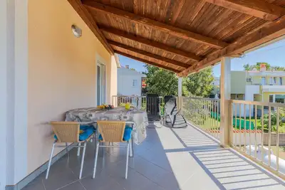 Image de Appartement confortable avec grande terrasse et vue sur le jardin