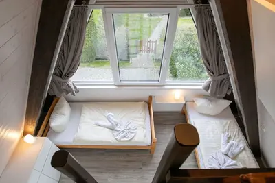 Image de Joli appartement dans une maison de vacances avec Tv, terrasse, animaux admis et parking