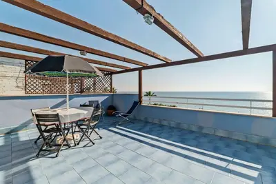 Image de Appartement en bord de mer à Policastro Bussentino avec piscine