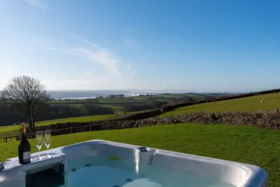 Image de Jolie grange de 2 chambres avec bain à remous à proximité des plages du North Devon