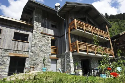 Image de Chalet L' Ours Blanc 12 Personnes, sauna, jacuzzi chauffé toute l'année.