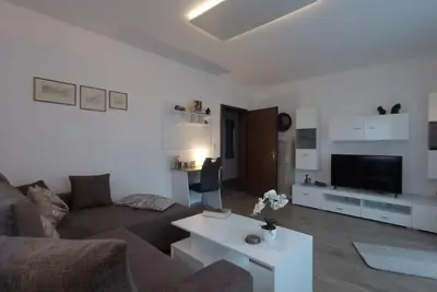 Image de Appartement (65m2) avec une grande terrasse