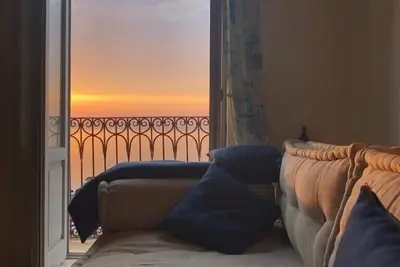 Image de Maison avec terrasse face Ă la mer