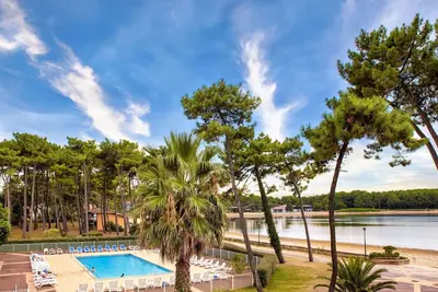 Image de Joli appartement pour 4 personnes avec piscine, Wifi, Tv, terrasse, animaux admis et parking