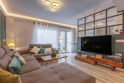 Image de Elegant apartment ideal for families at 15min from Alhambra. 3 bathrooms, optional parking.