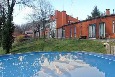 Image de La Maison Transparente: \"La Rosa\" Appartement dans villa avec piscine -M0240060010