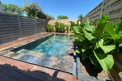 Image de Appartement avec jardin, piscine privée à 5 min à pied du centre de ville.