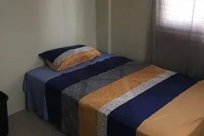 Image de Immeuble de 2 étages Condotel avec 2 chambres, cuisinette, terrasse et stationnement