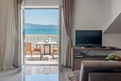 Image de Appartement sur la côte avec sa propre plage