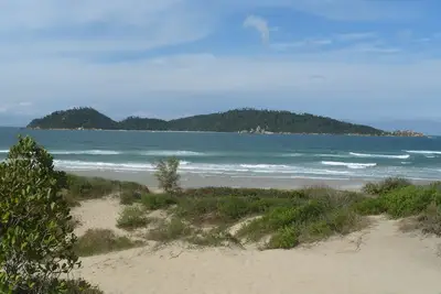 Image de Praia do Campeche, maison à 150m de la mer.