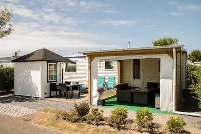 Image de Chalet en bord de mer dans un magnifique parc de vacances *****