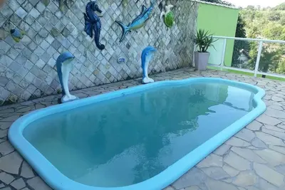 Image de Location maison pour la saison, près de la plage de Barra de Maricá et des restaurants.