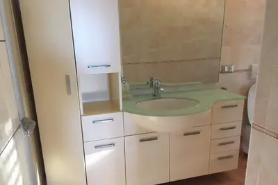Image de Appartement gratte-ciel avec vue imprenable directement sur la plage