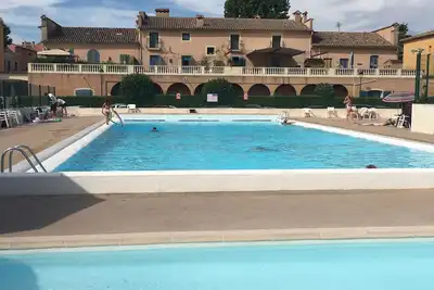 Image de Appartement  avec terrasse, piscine et garage. Idéal pour 2.