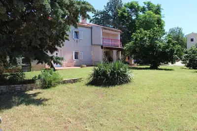 Image de Maison de vacances Smokvica dans un environnement verdoyant