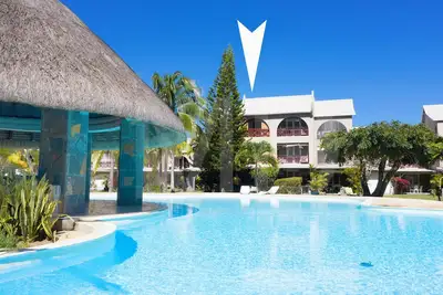 Image de Ken 19 dans beau complexe avec piscine. 100m de la plage, wifi gratuit
