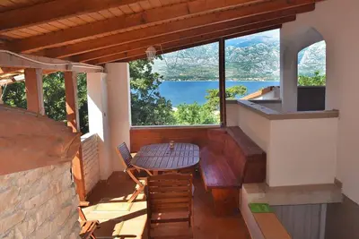 Image de Appartement avec terrasse, vue sur la mer et grill, piscine communautaire, WiFi gratuit