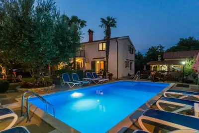 Image de Joli appartement avec climatisation, Wifi, piscine, Tv, terrasse et animaux admis