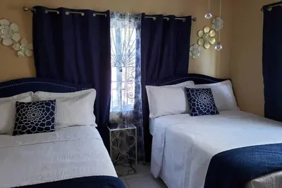 Image de Deux chambres à distance de marche de la plage