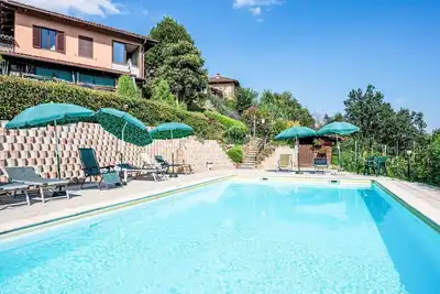 Image de Joli appartement dans une maison de vacances avec Wifi, piscine, Tv, patio et animaux admis