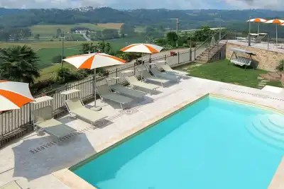Image de Joli appartement pour 4 personnes avec piscine, Wifi, Tv, patio, animaux admis et parking