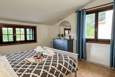 Image de Joli appartement pour 4 personnes avec piscine, Wifi, patio, animaux admis et vue panoramique