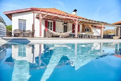 Image de Maison landaise avec piscine chauffée