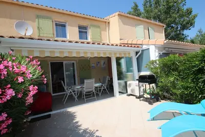 Image de Belle Maison lumineuse toute climatisee -veranda -Wifi fibre -4 couchages, Exposition Sud-. . .