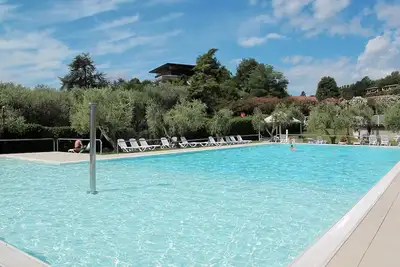 Image de Bel appartement avec Wifi, climatisation, piscine, Tv, terrasse, animaux admis et parking