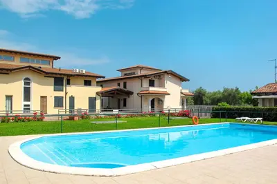 Image de Agréable appartement avec piscine, climatisation, Wifi, Tv, patio, animaux admis et parking