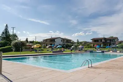 Image de Agréable appartement avec climatisation, Wifi, piscine, Tv, terrasse et animaux admis