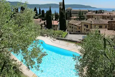 Image de Confortable appartement avec Wifi, piscine, climatisation, Tv, patio et animaux admis