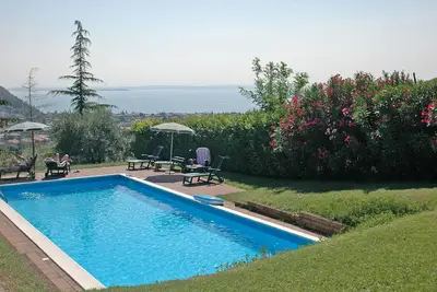 Image de Agréable appartement avec piscine, climatisation, Wifi, Tv, patio, animaux admis et parking