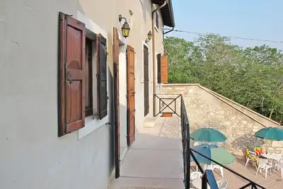 Image de Confortable appartement avec piscine, climatisation, Wifi, Tv, patio, animaux admis et parking
