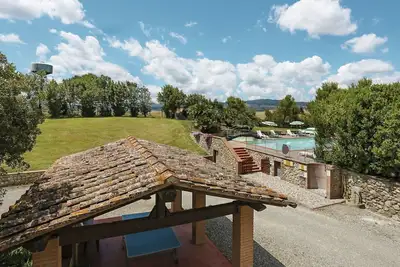 Image de Joli appartement dans une maison de vacances avec Wifi, piscine, Tv, terrasse et animaux admis