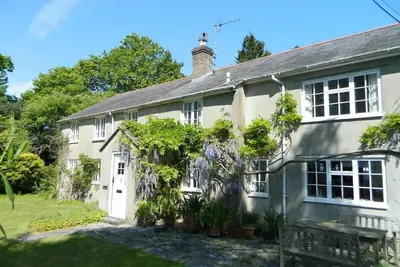 Image de River Cottage a country retreat in wooded gardens