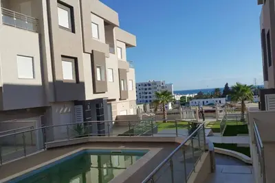 Image de Triplex independant avec Piscine commune @ Residence Tilel