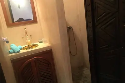 room with bathroom in 19th century riad