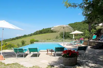 Image de Confortable appartement dans une maison de vacances avec piscine, Wifi, Tv, patio, vue panoramique