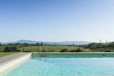 Image de Appartement dans une maison de vacances avec Wifi, climatisation, piscine, bain à remous, Tv, patio