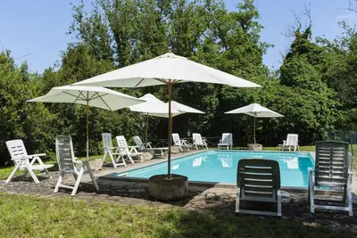 Image de Joli appartement dans une maison de vacances avec piscine, Wifi, Tv, patio, animaux admis, parking