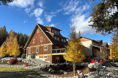 Image de 7 chambres 5. 5 salles de bains. Spa privé. 14 couchages. Paradis des familles et des golfeurs
