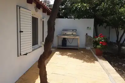 Image de Villa Maria, une maison de village calme avec piscine et vue sur la campagne.
