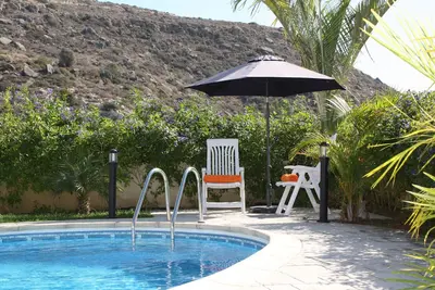 Image de Villa de vacances, dans la baie de Pissouri, piscine privée, jardin paysagé. Wifi gratuit.