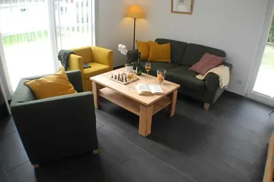 Image de Maison de vacances dans le Seepark Nordhorn avec sauna, bain à remous et cheminée