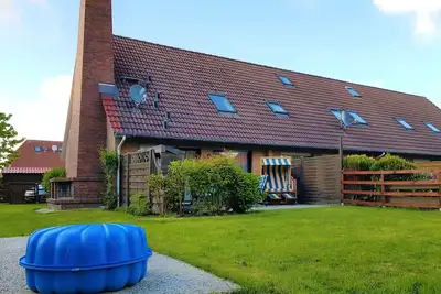 Image de Maison de vacances confortable pour les enfants et les chiens dans un quartier résidentiel calme